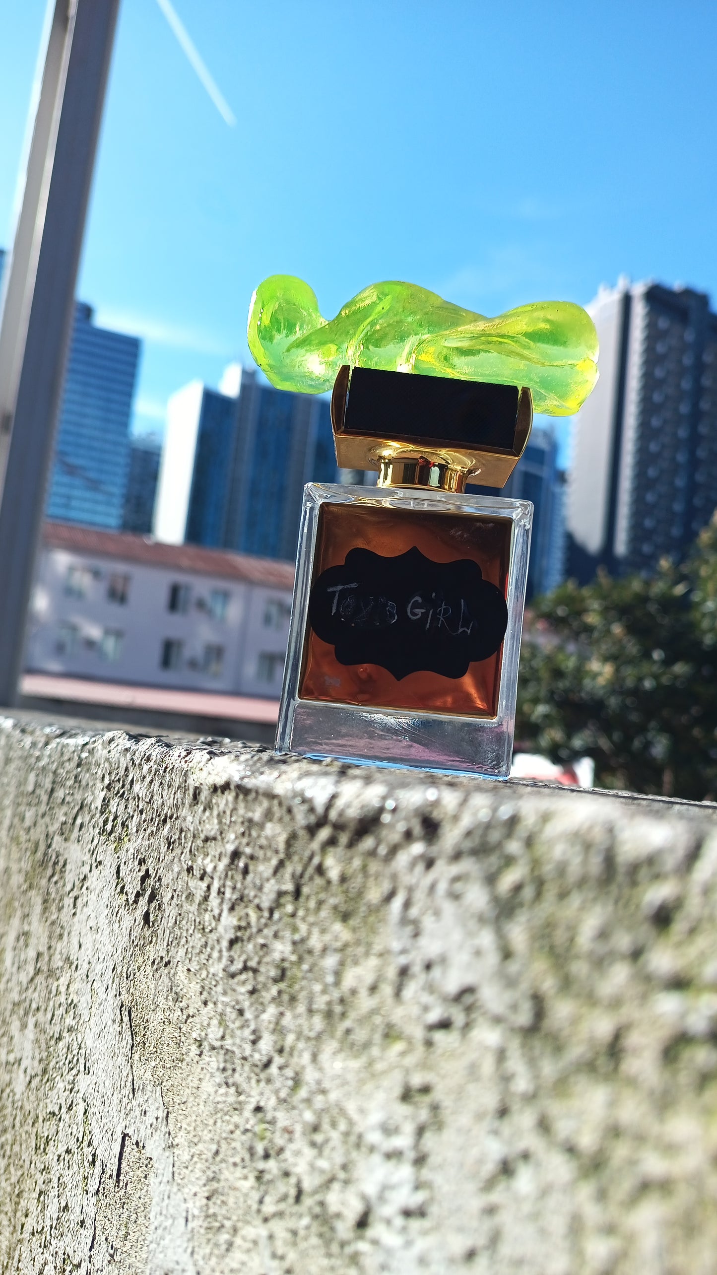 Pefume in hand made uranium glass bottle