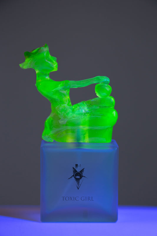 Pefume in hand made uranium glass bottle