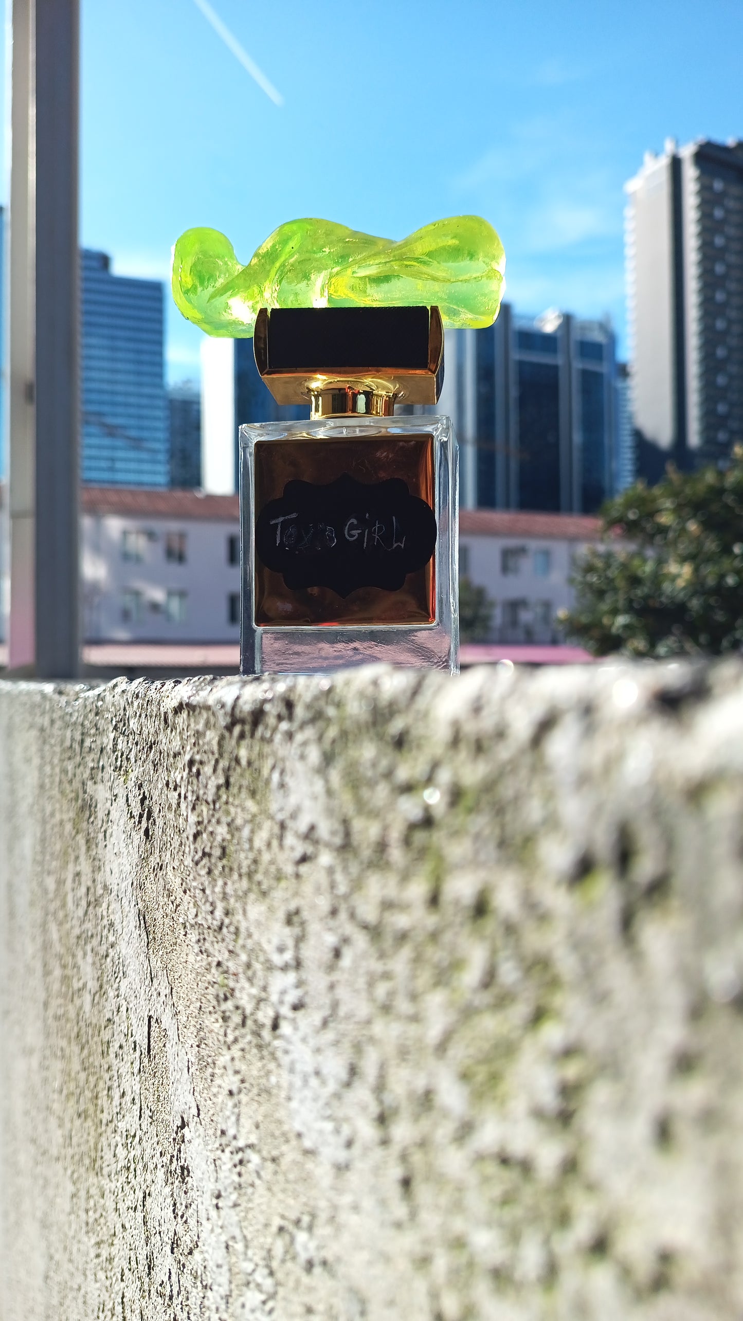 Pefume in hand made uranium glass bottle