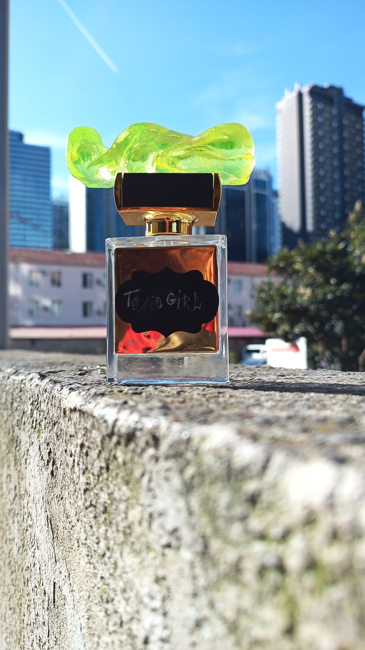 Pefume in hand made uranium glass bottle