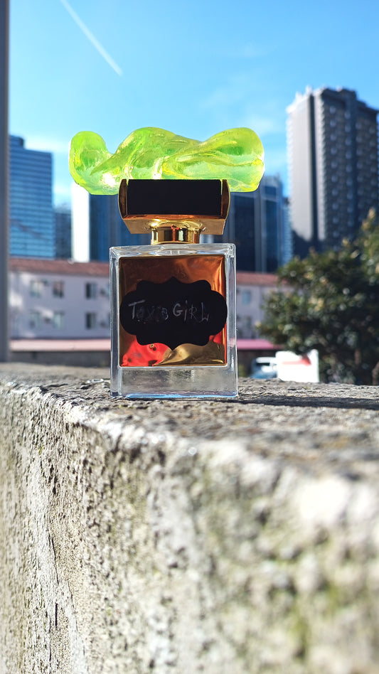 Pefume in hand made uranium glass bottle